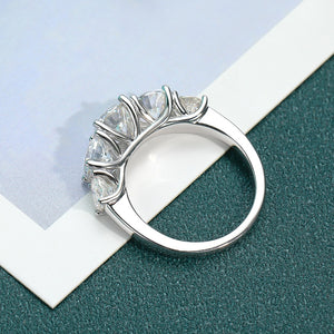 Women's S925 Moissanite Round Channel Shoulders Ring. - Different Drips