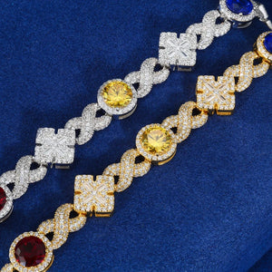 Infinity-Link Bracelet with Canary & Sapphire-Blue Rounds, Cross Center - Different Drips