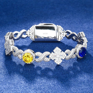 Infinity-Link Bracelet with Canary & Sapphire-Blue Rounds, Cross Center - Different Drips