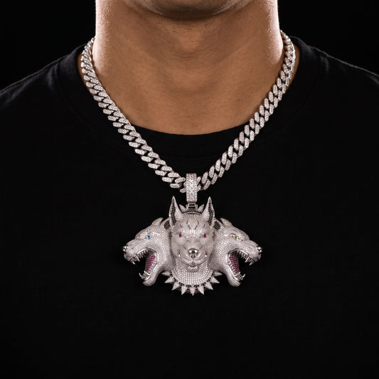 Iced Cerberus pendant with three dog heads, colored eye stones and spiked collar