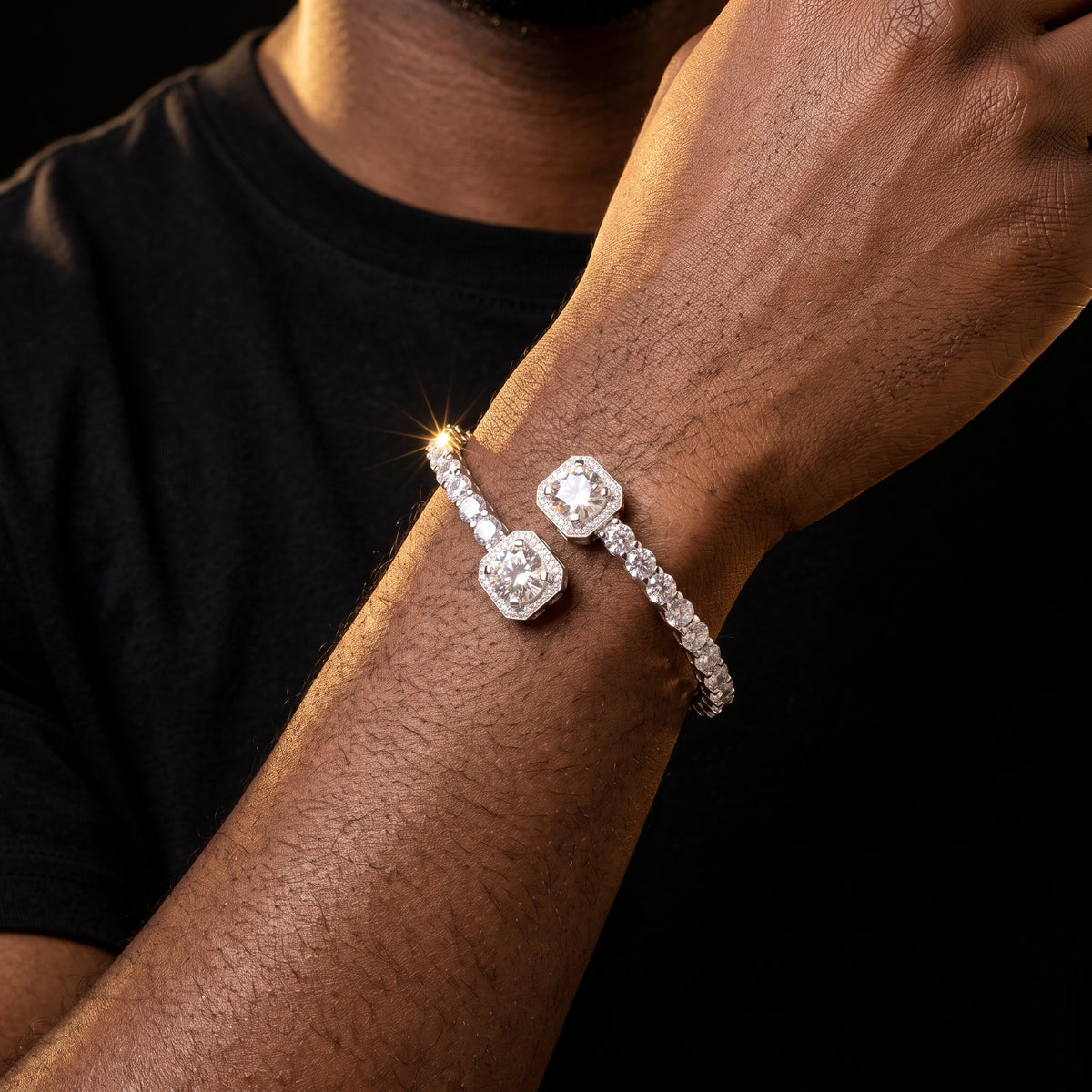 Rigid tennis bangle with clustered moissanite stones in sterling silver