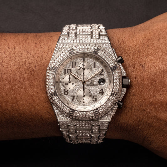 Iced octagonal chronograph watch with screw head bezel and stone-set case