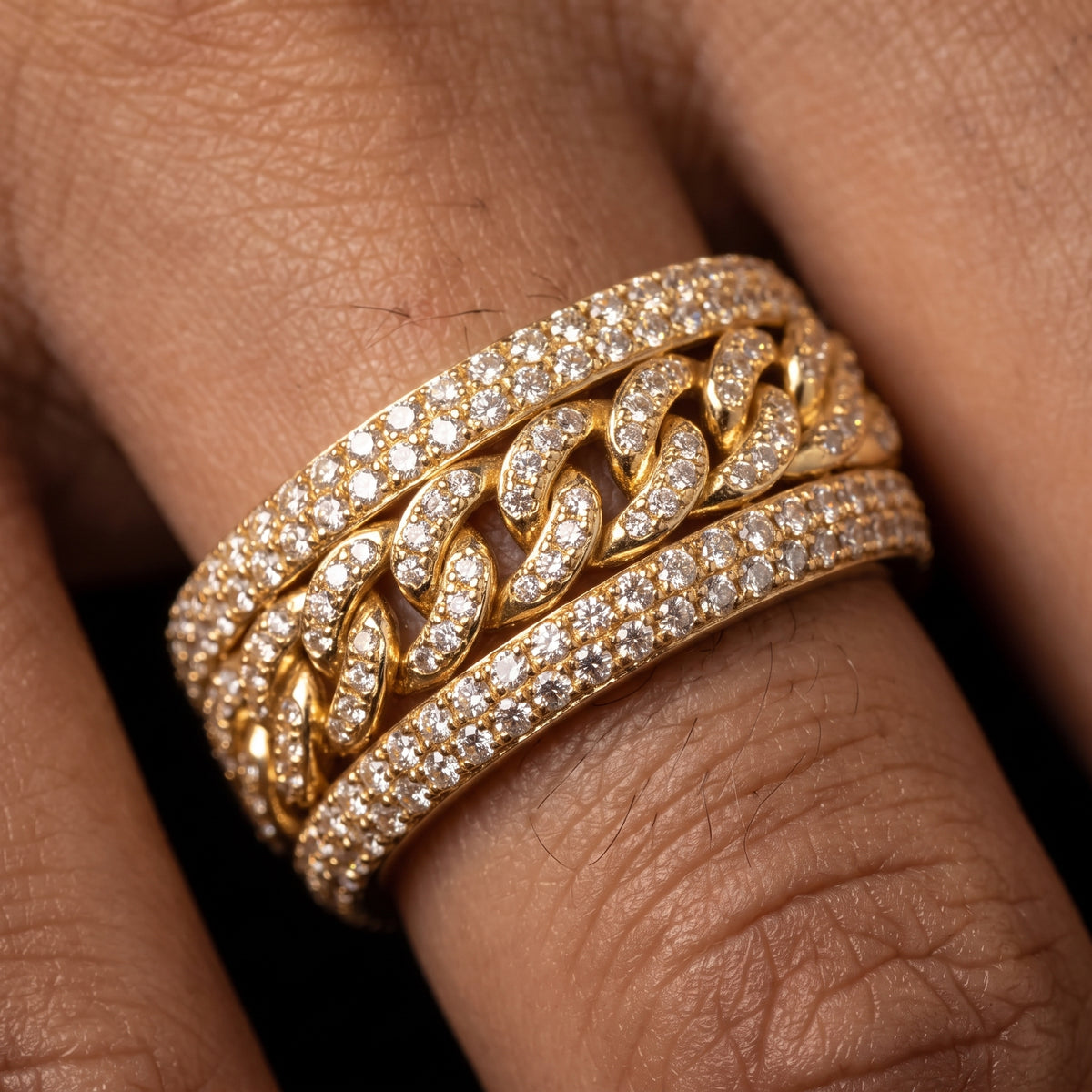 Iced Cuban link ring with a rotating center band of prong-set stones