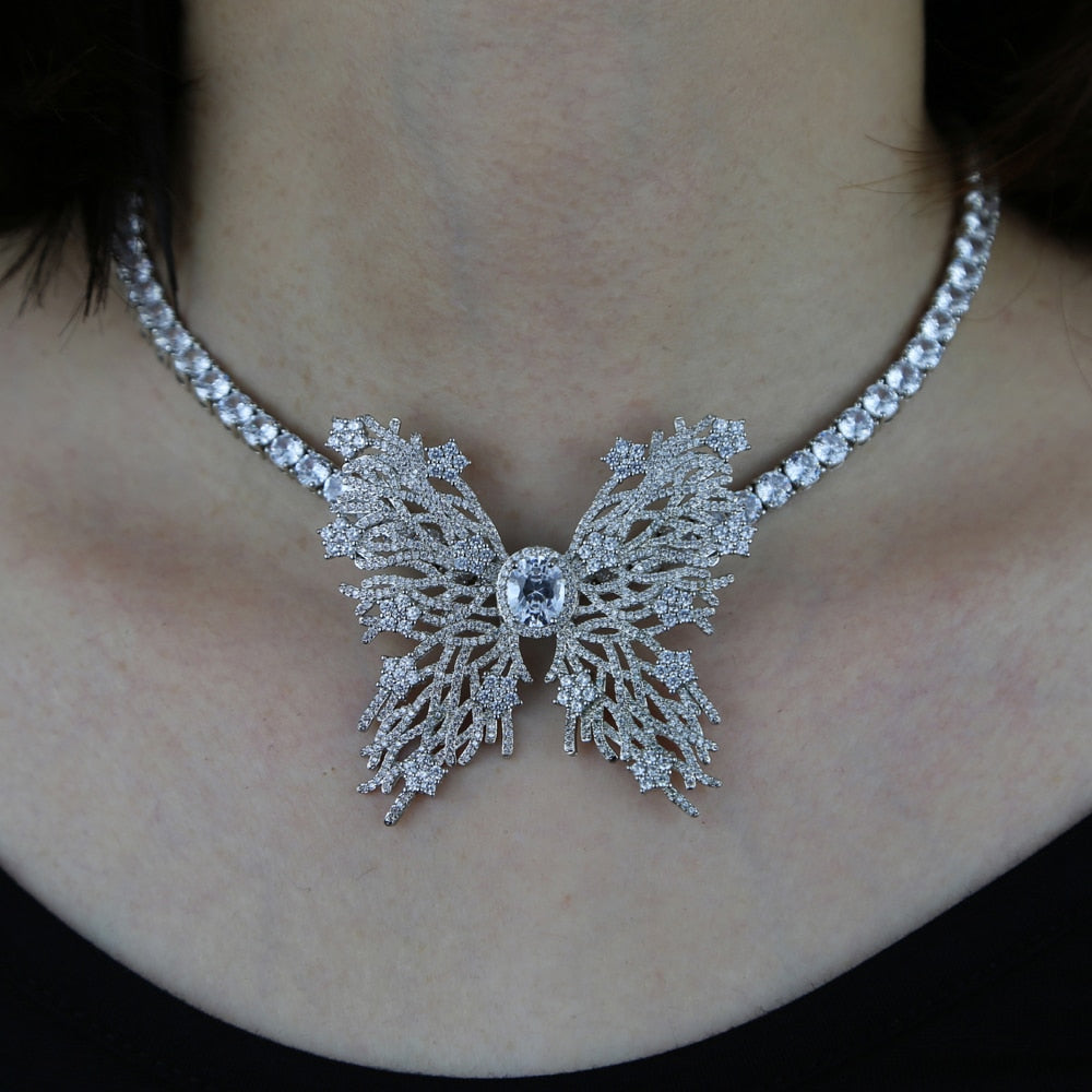 Women's Iced Out Hollow Butterfly Pendant - Different Drips